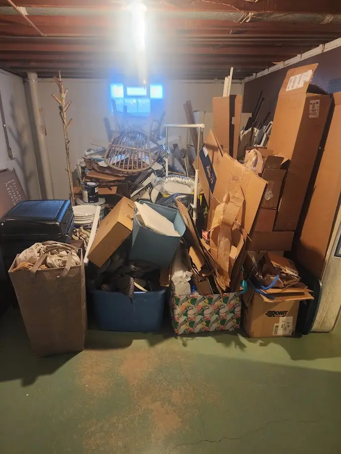 Roll-off dumpster container at job site for 2 Yard Dumpster Rental in Windsor